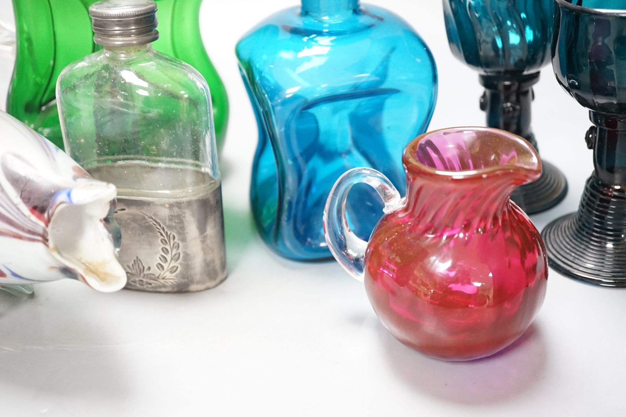 Two green glass goblets, decanters, Murano glass fish, silver plate mounted hip flask etc.